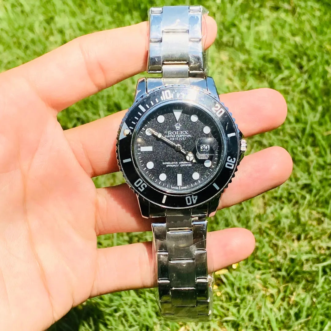 Rolex Silver + Black Dial